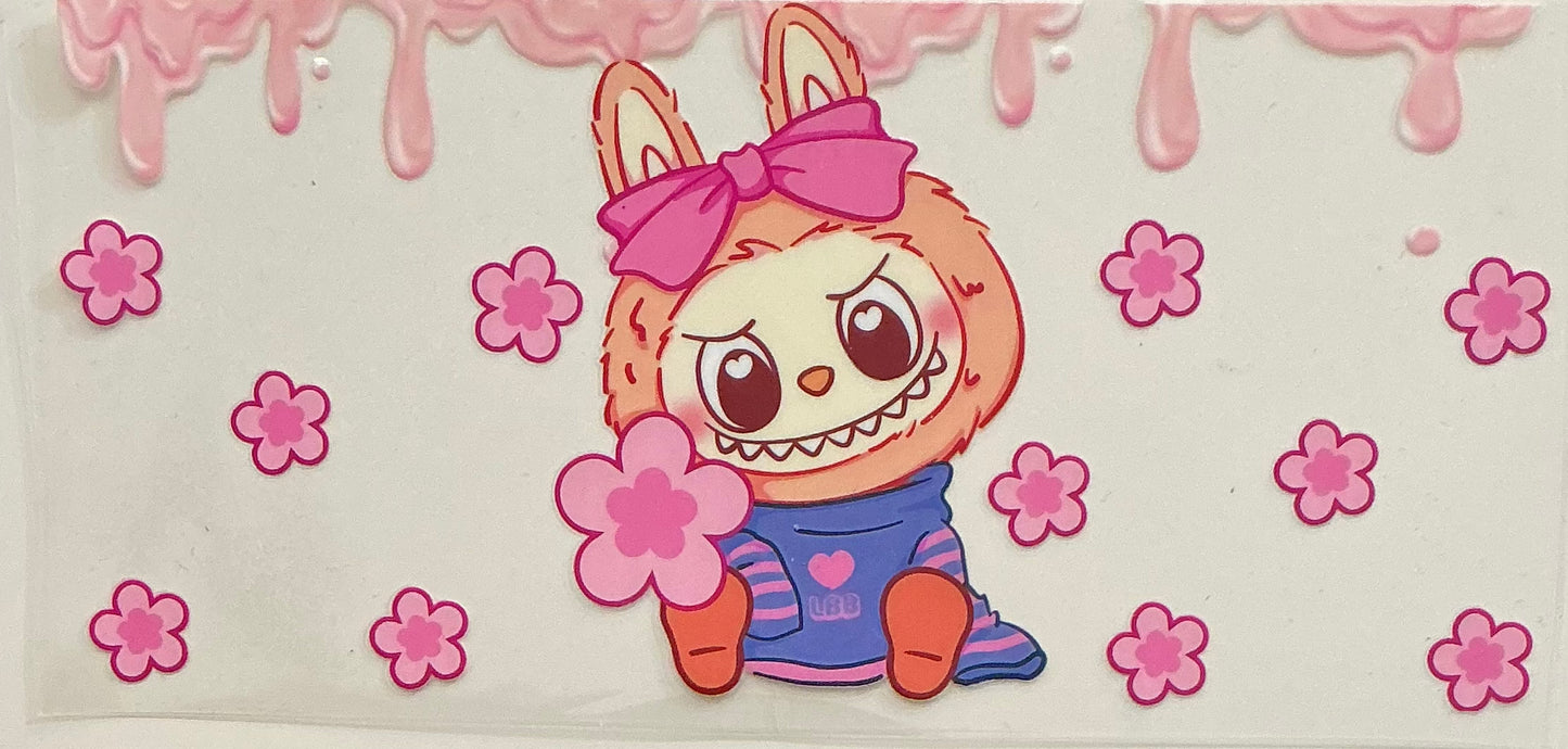 258 LABUBU SITTING W/PINK FLOWERS