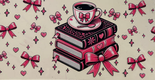 910   WHITE CUP ON 3 BOOKS W/PINK RIBBONS
